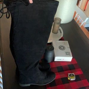 Thigh high black boots